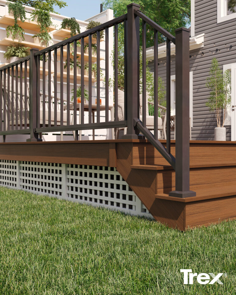 Front view of Dan Brown Trex Deck including Railing, deck, and steps