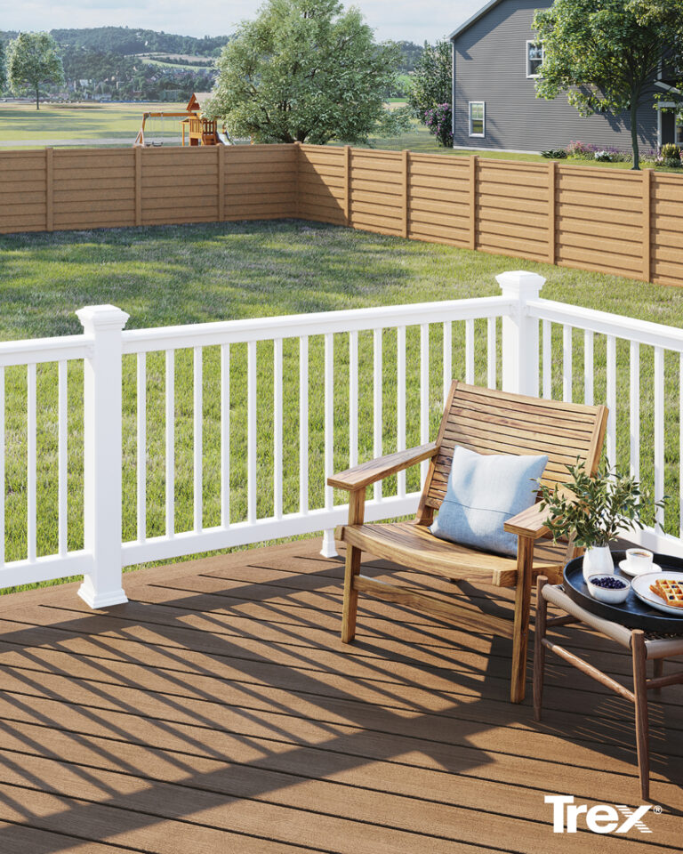Bright sunny day with a chair on a Trex deck built by dan brown